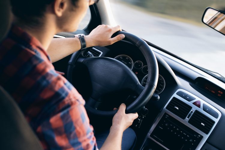 A student practises on the road after he decides to learn to drive in a week.